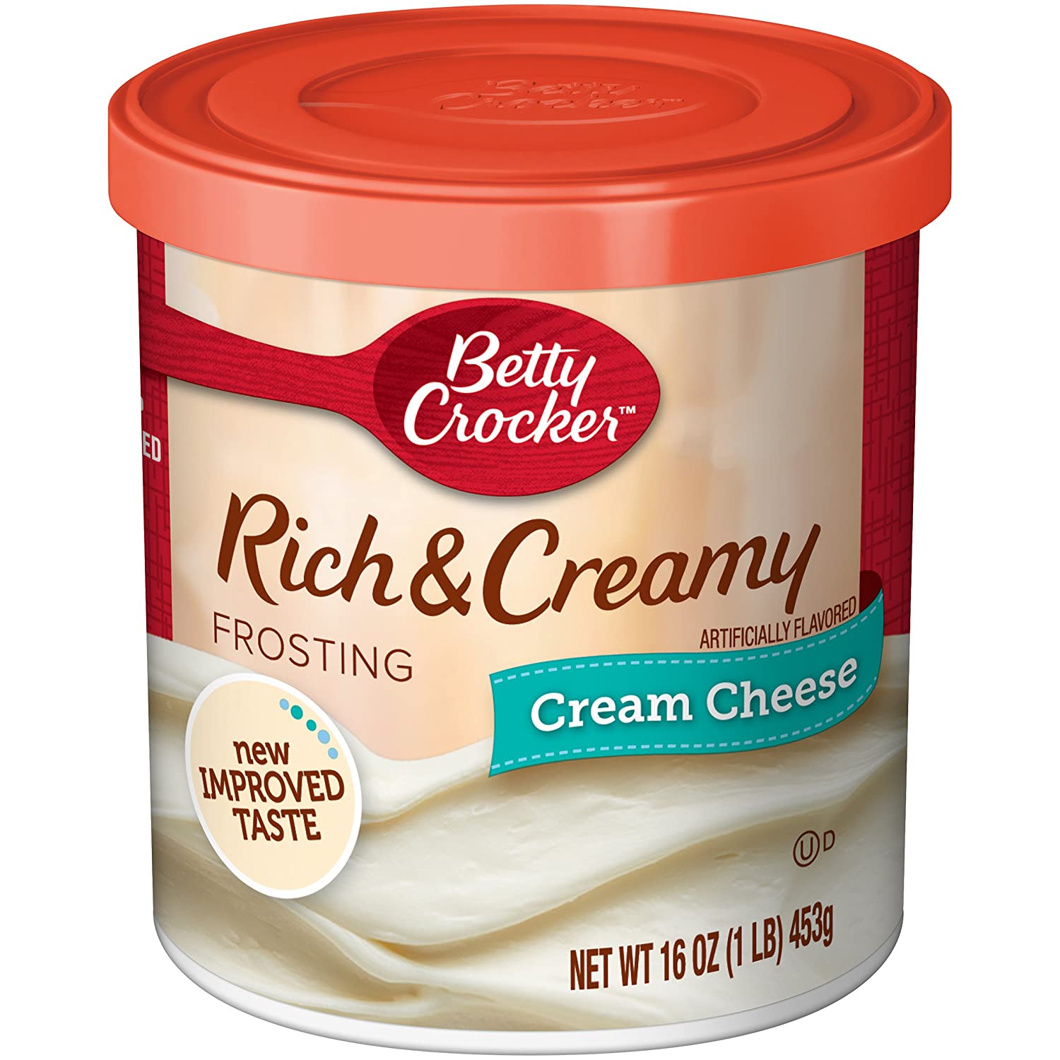 A container of Betty Crocker Rich & Creamy Cream Cheese Frosting, 16 oz size, with the label displaying the product name and a 'new taste' tagline.